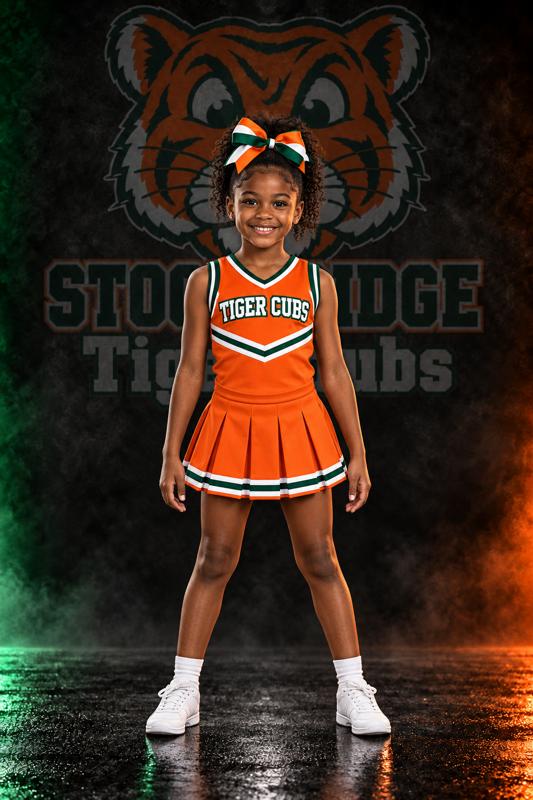 Young Tiger Cubs cheer athlete